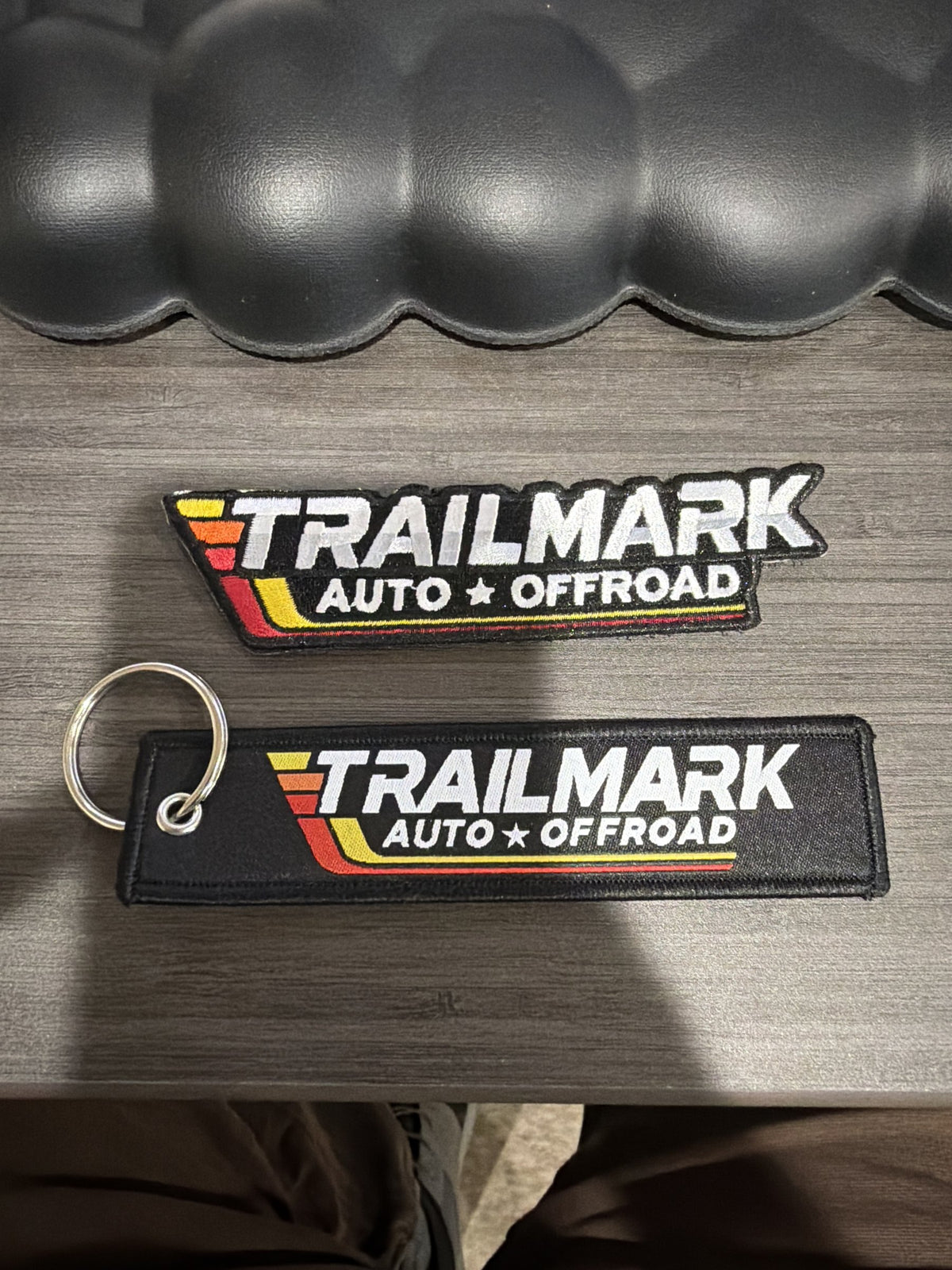 Trailmark patch and Trailmark keychain